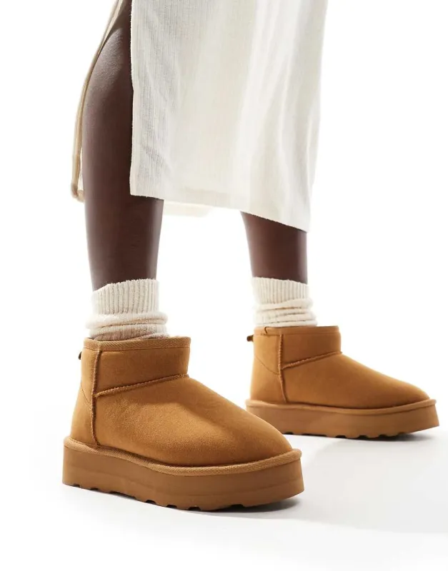 ONLY faux suede teddy lined boots in brown sold by ASOS
