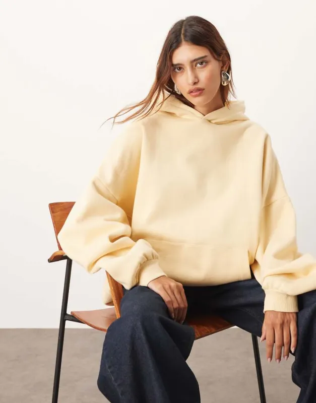 ARRANGE oversized premium heavy weight hoodie in buttermilk-Yellow sold by ASOS