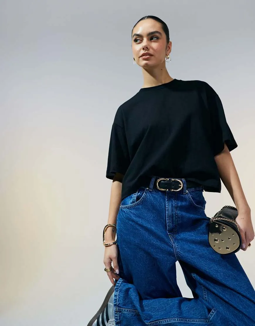 ASOS DESIGN boxy cropped t-shirt in black sold by ASOS