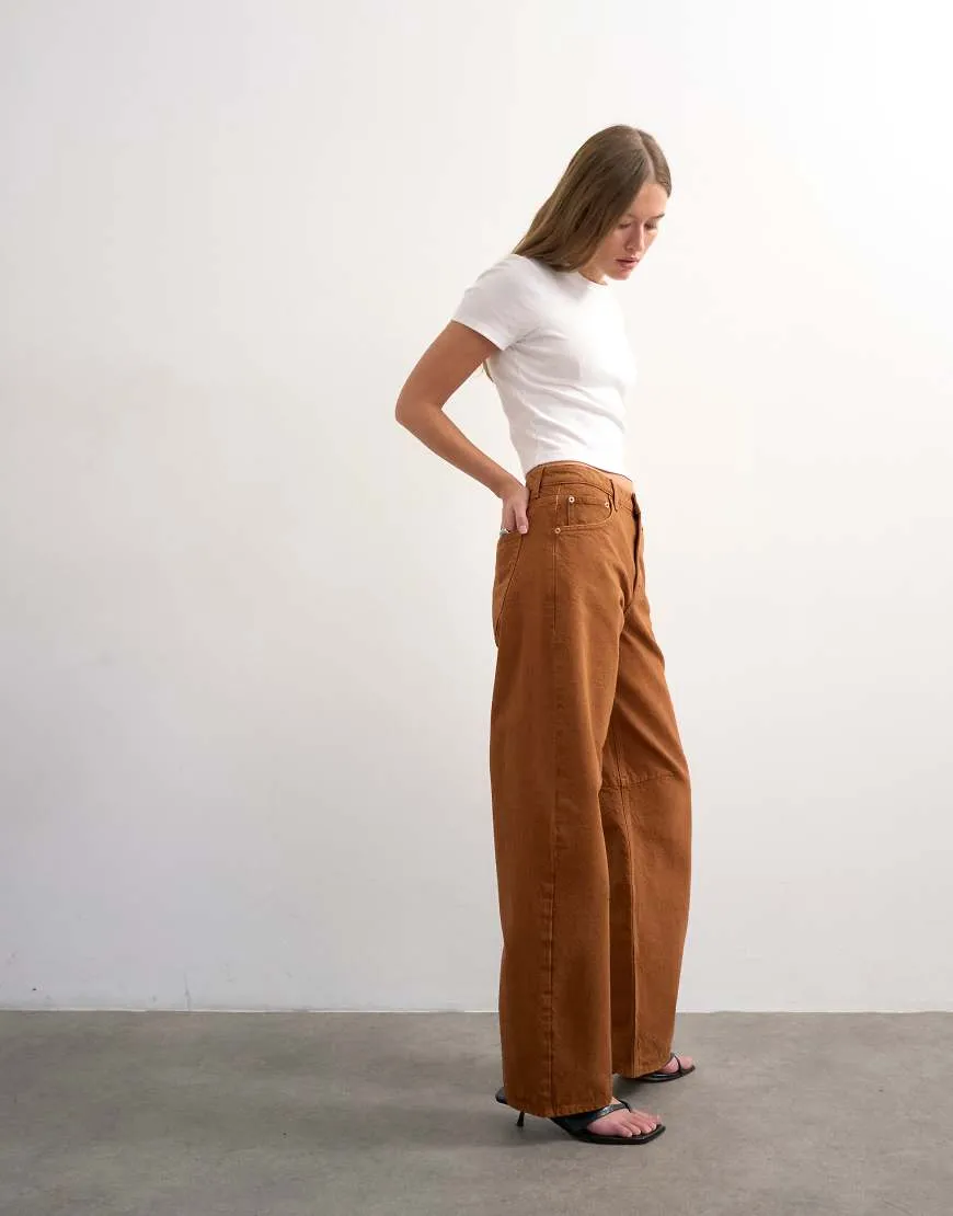 Topshop Barrel mid rise jean in toffee-Brown sold by ASOS