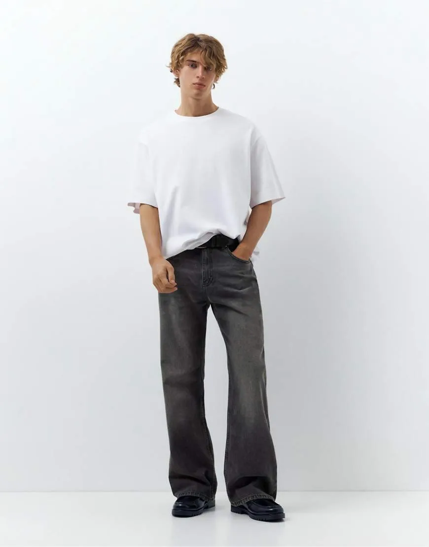 Pull&Bear Flared jeans in faded black-Grey sold by ASOS