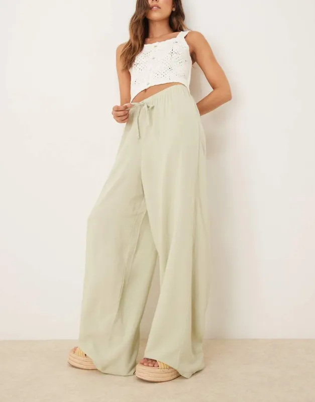 ASOS DESIGN linen blend pull on trouser in sage-Green made by ASOS
