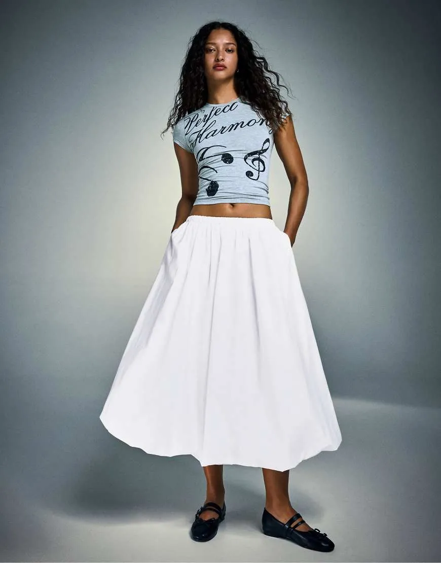 Bershka Balloon midi skirt in white sold by ASOS