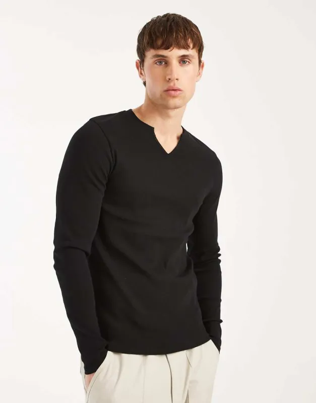ASOS DESIGN muscle fit long sleeve T-shirt with notch neck in black rib made by ASOS
