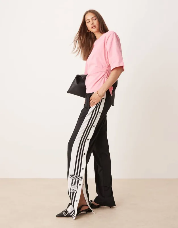 adidas Originals Adibreak track pants in black made by Adidas