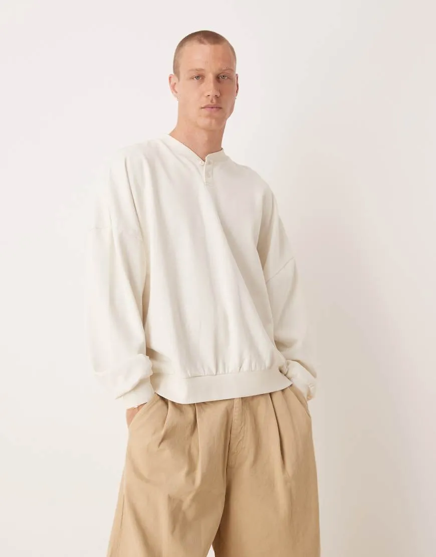 ASOS DESIGN extreme oversized sweatshirt with button-up collar in white-Neutral sold by ASOS
