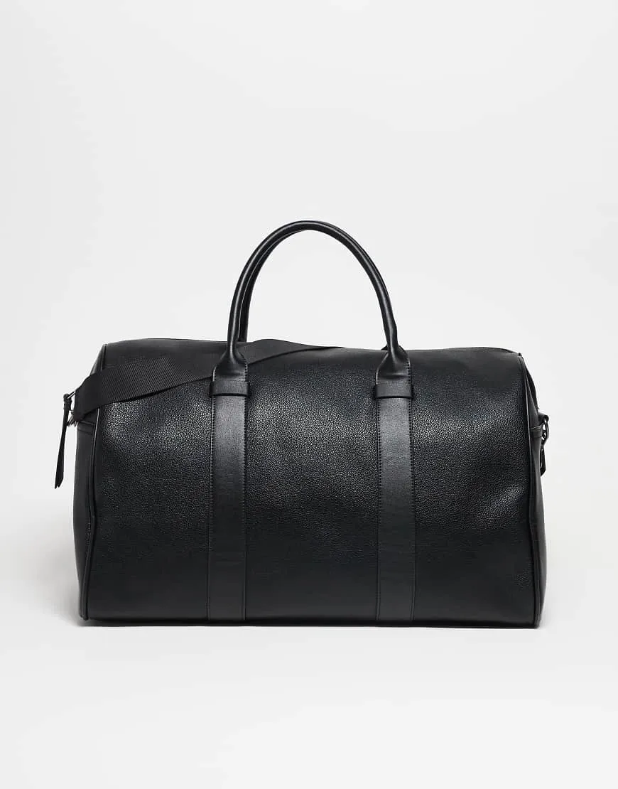 ASOS DESIGN faux leather holdall bag in black sold by ASOS