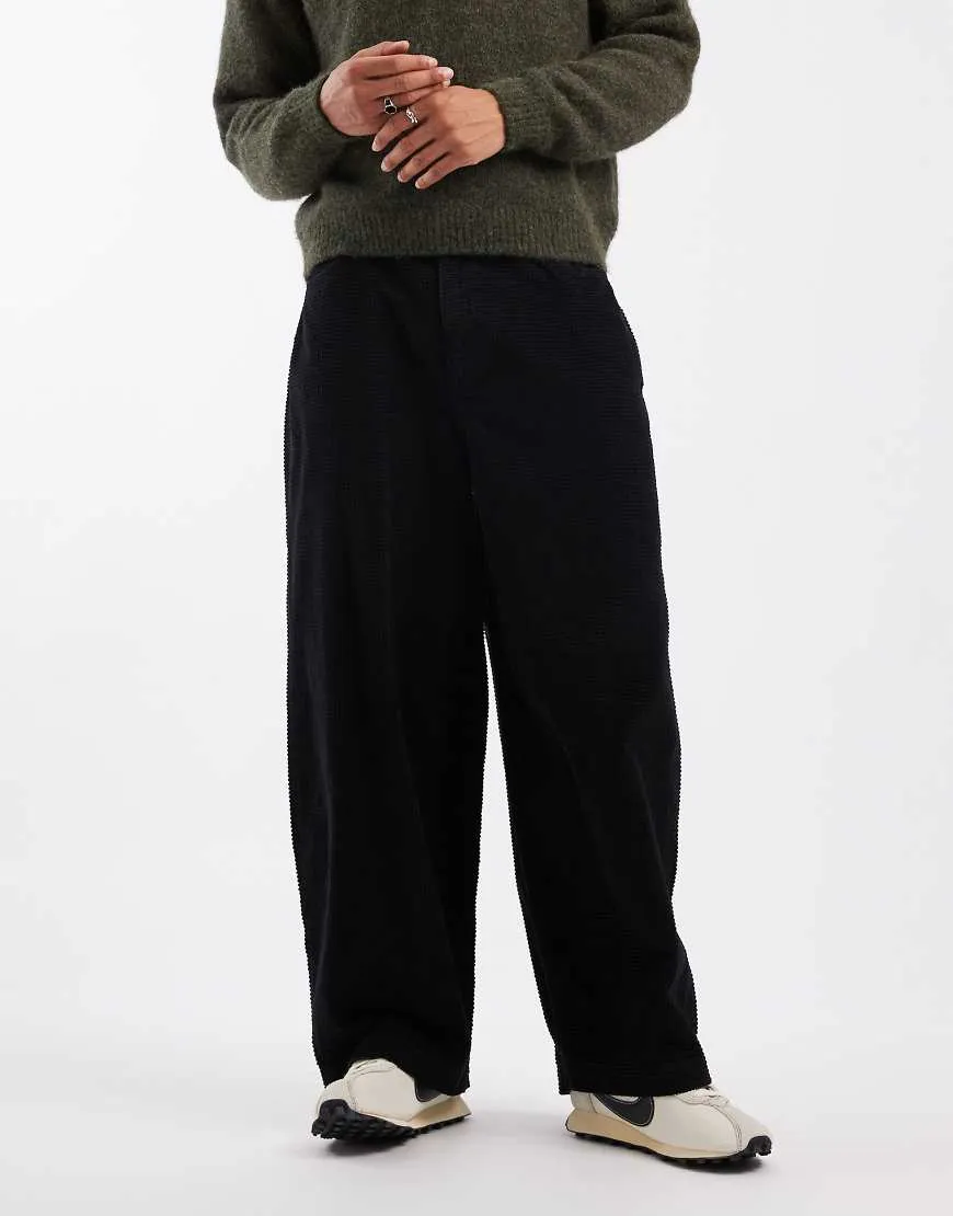 ASOS DESIGN oversized baggy trousers in black bubble corduroy sold by ASOS