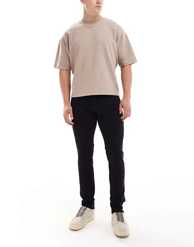 JJ Rebel Luke slim fit jeans in black made by ASOS