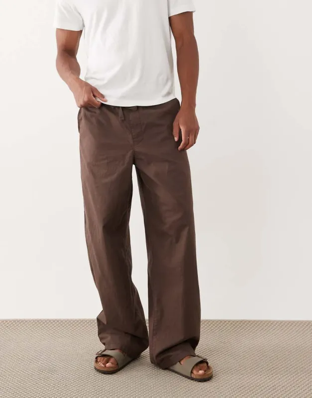 ASOS DESIGN baggy fit linen blend trousers in brown made by ASOS
