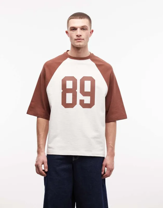 ASOS DESIGN heavyweight oversized t-shirt with chest print in off white and red made by ASOS