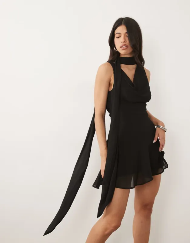 Never Fully Dressed Sophie chiffon cowl neck removable scarf detail mini dress in black made by ASOS