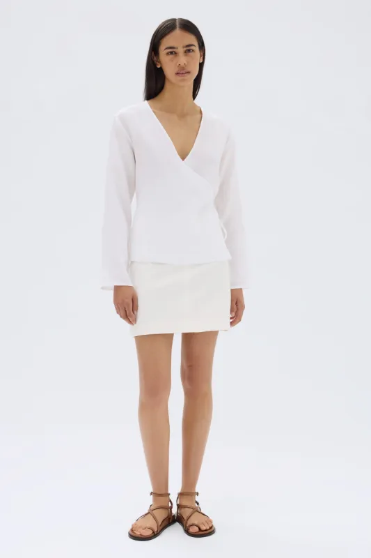 Renee Linen Wrap Top sold by Assembly Label