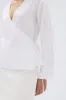 Renee Linen Wrap Top sold by Assembly Label