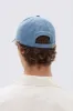 Pax Cap sold by Assembly Label