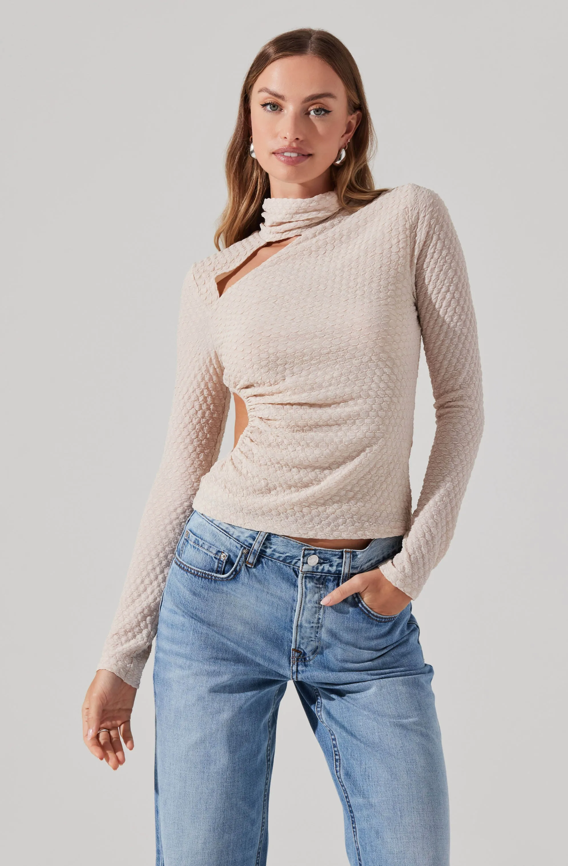 Textured Cutout Long Sleeve Top sold by Astr