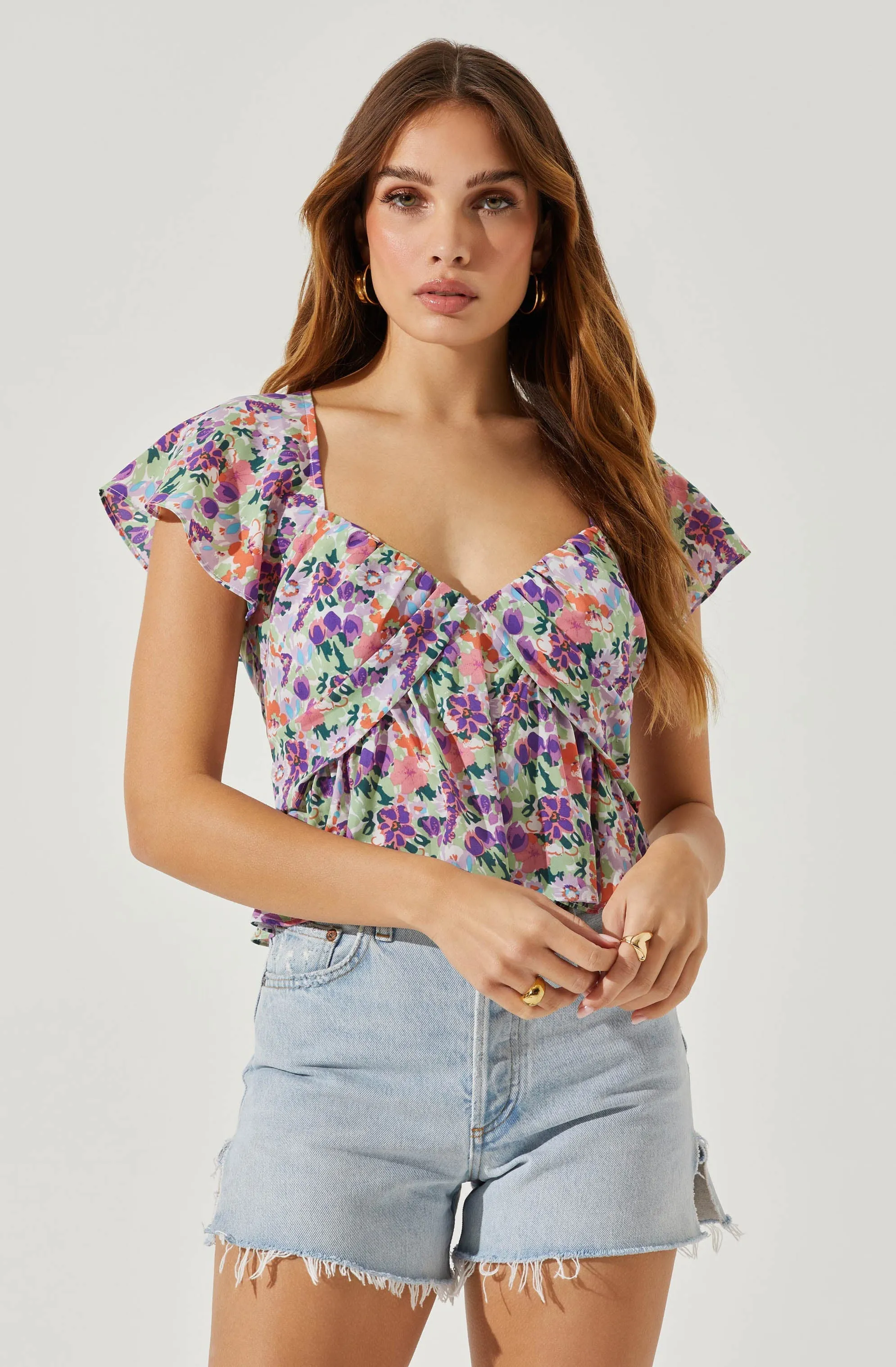 Flutter Sleeve Flowy Floral Top sold by Astr
