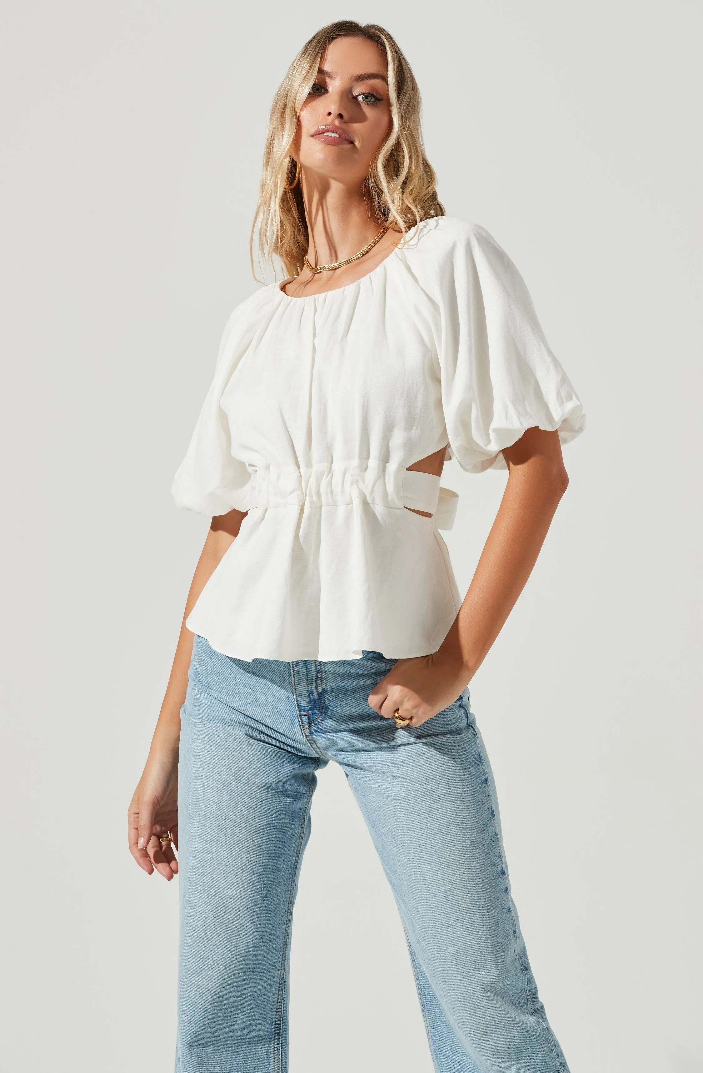 Vendetti Cutout Puff Sleeve Top sold by Astr