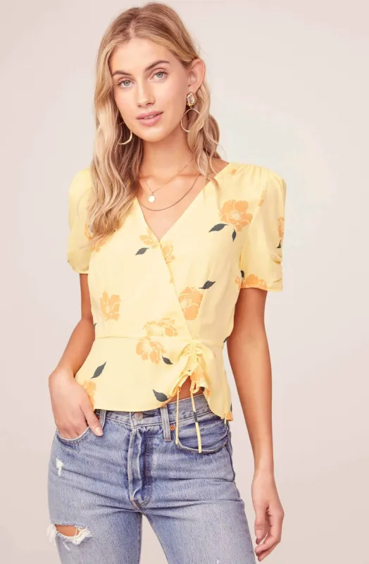 Cinch Sleeve Floral Wrap Top sold by Astr
