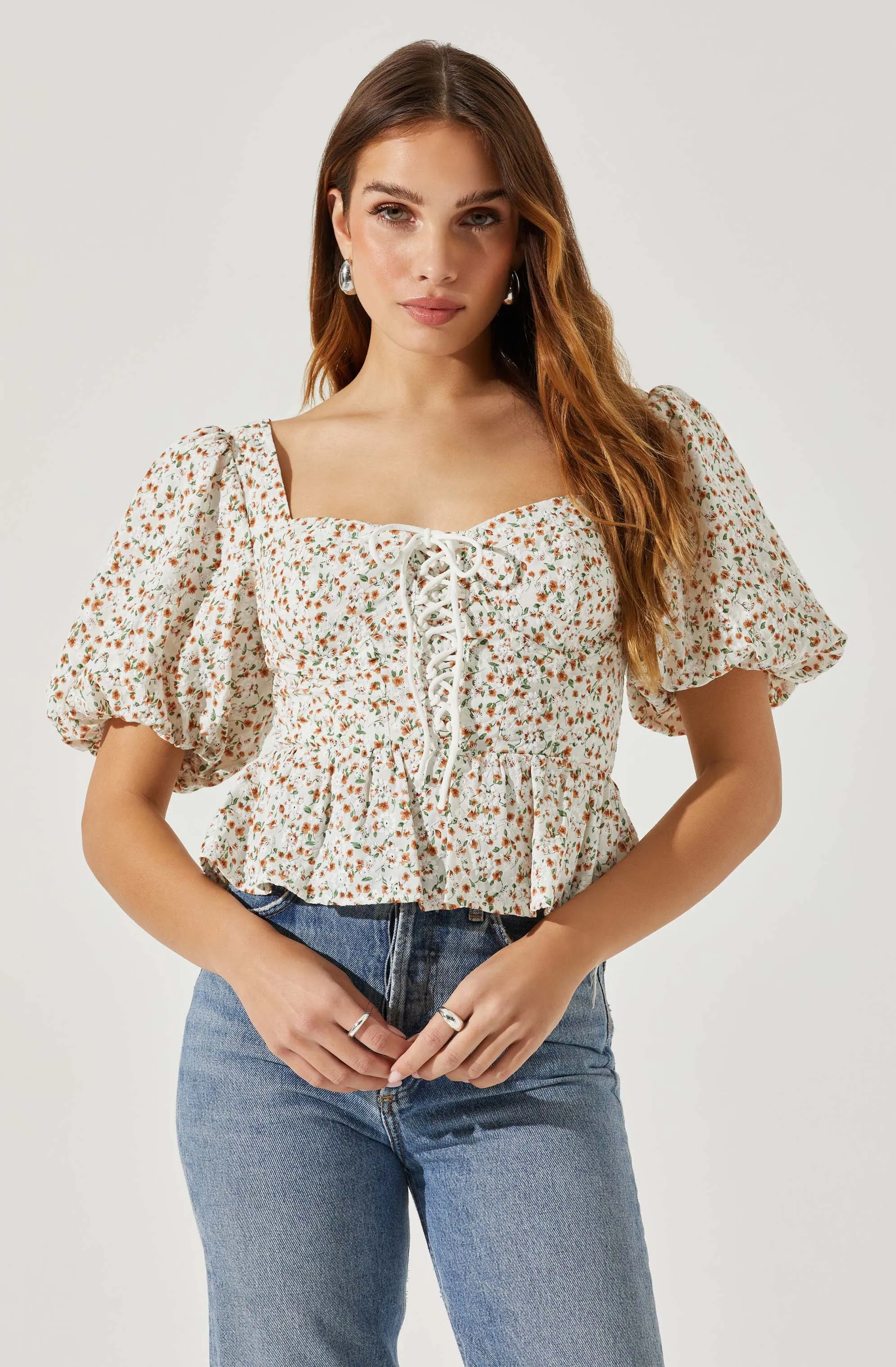 Bubble Sleeve Front Tie Floral Top sold by Astr