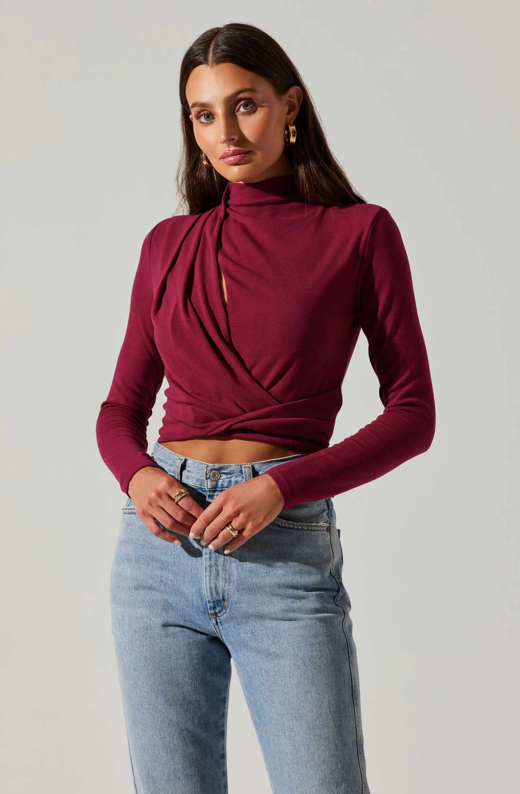 Asymmetrical Pleated Cutout Mock Neck Top sold by Astr