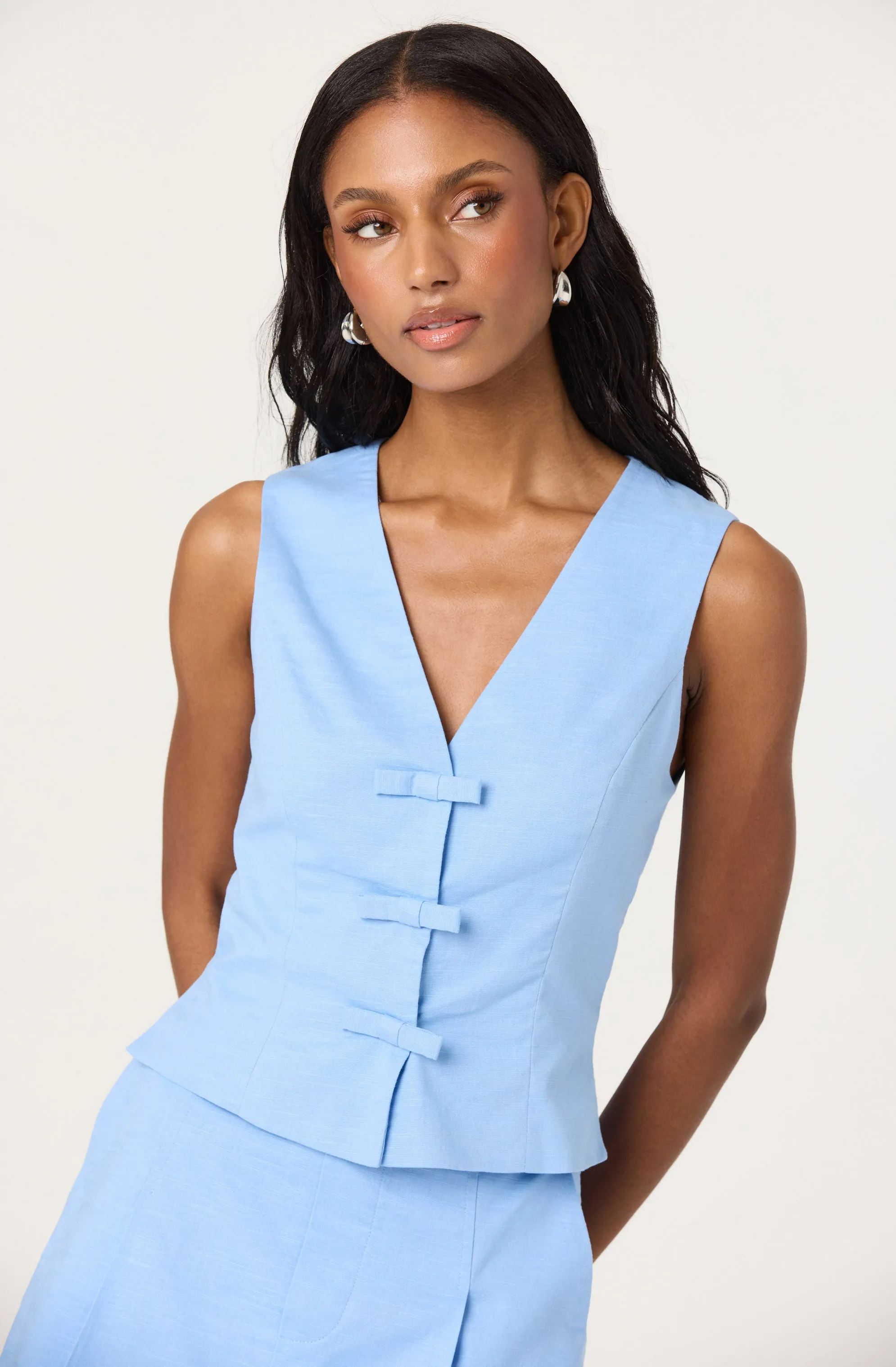 Bow Front V-Neck Top sold by Astr