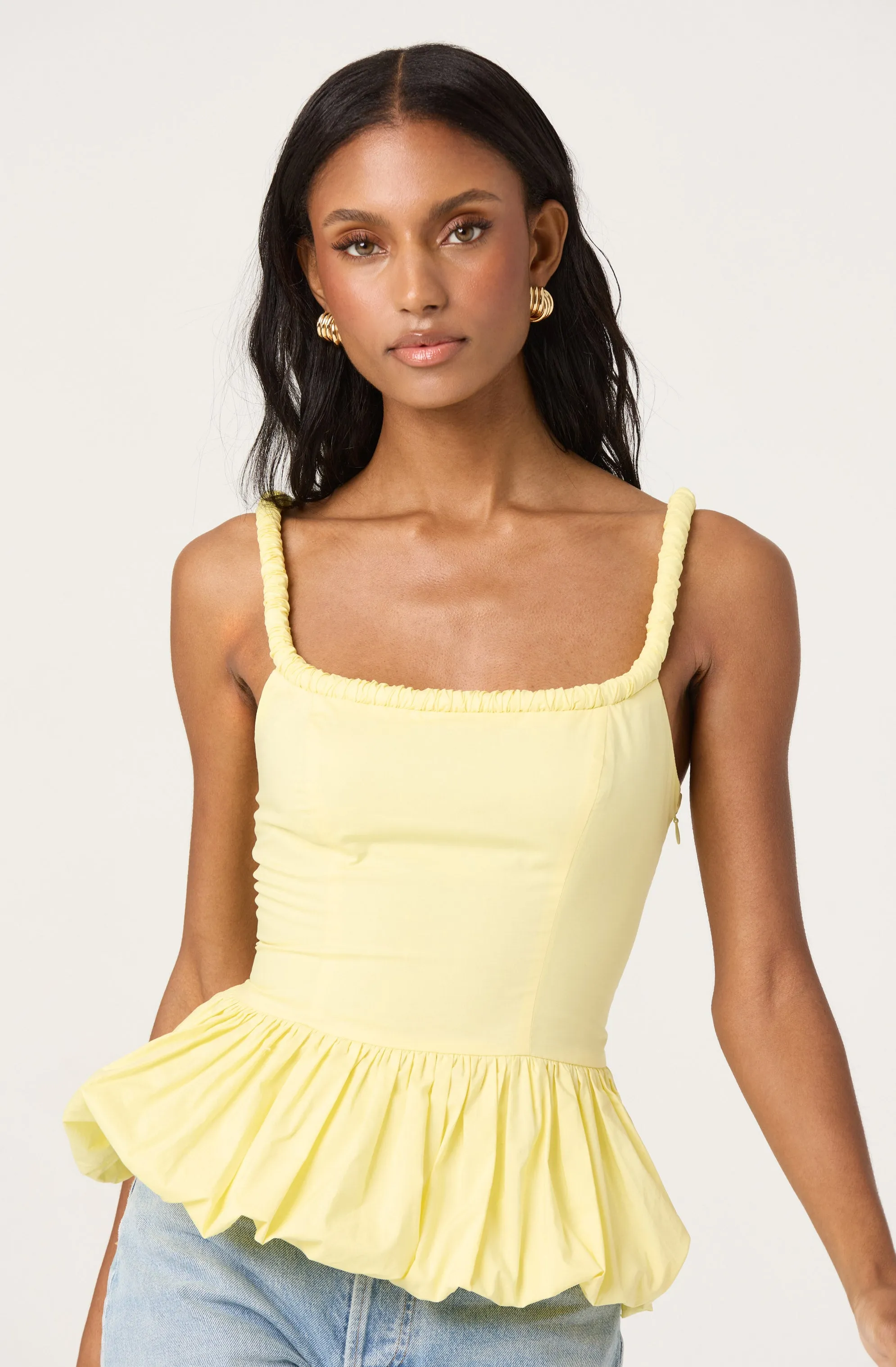 Sleeveless Bubble Hem Peplum Top sold by Astr