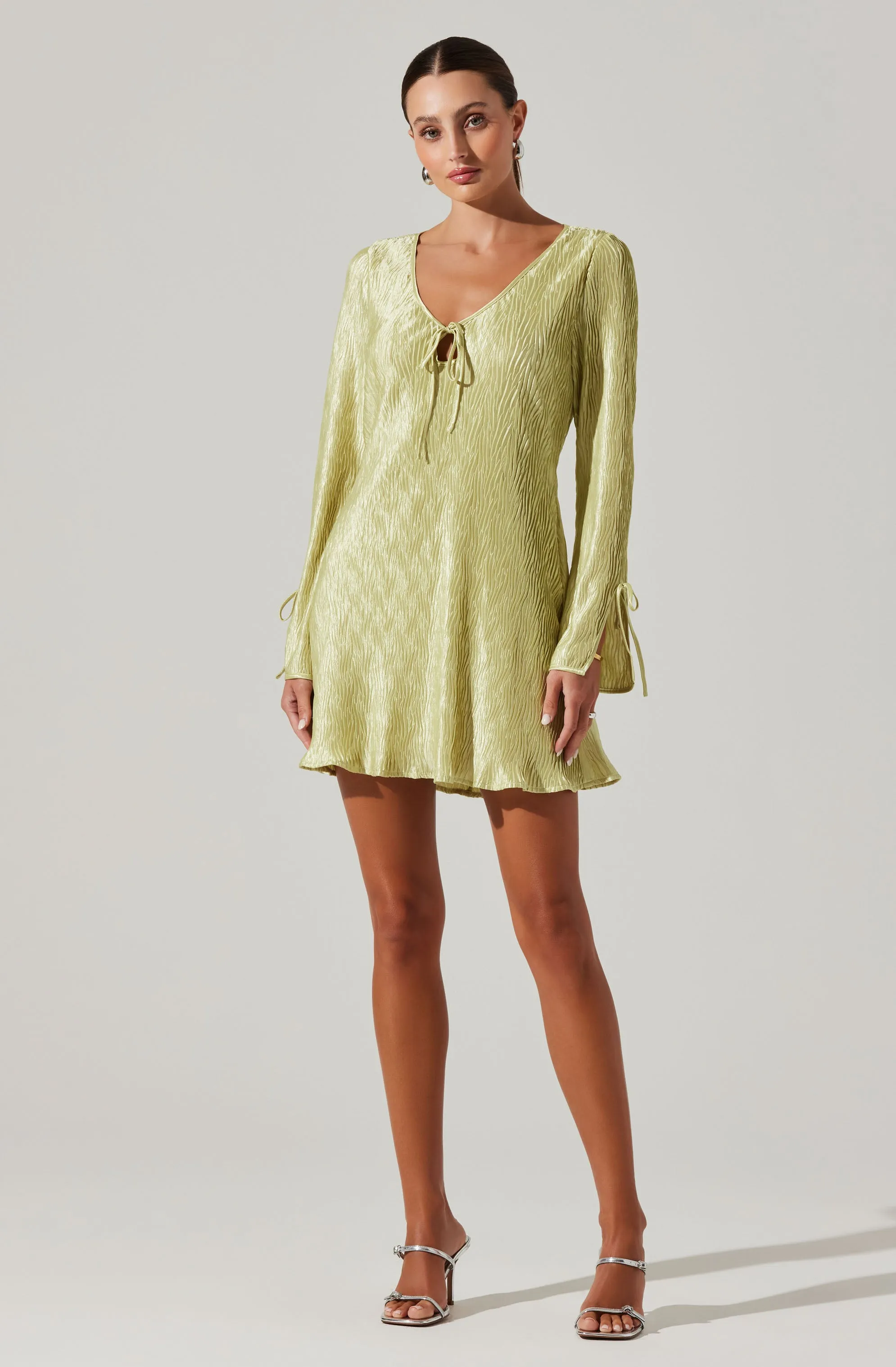 Textured Plisse Long Sleeve Mini Dress sold by Astr