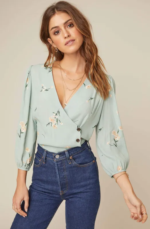 Button Wrap Front Floral Top sold by Astr