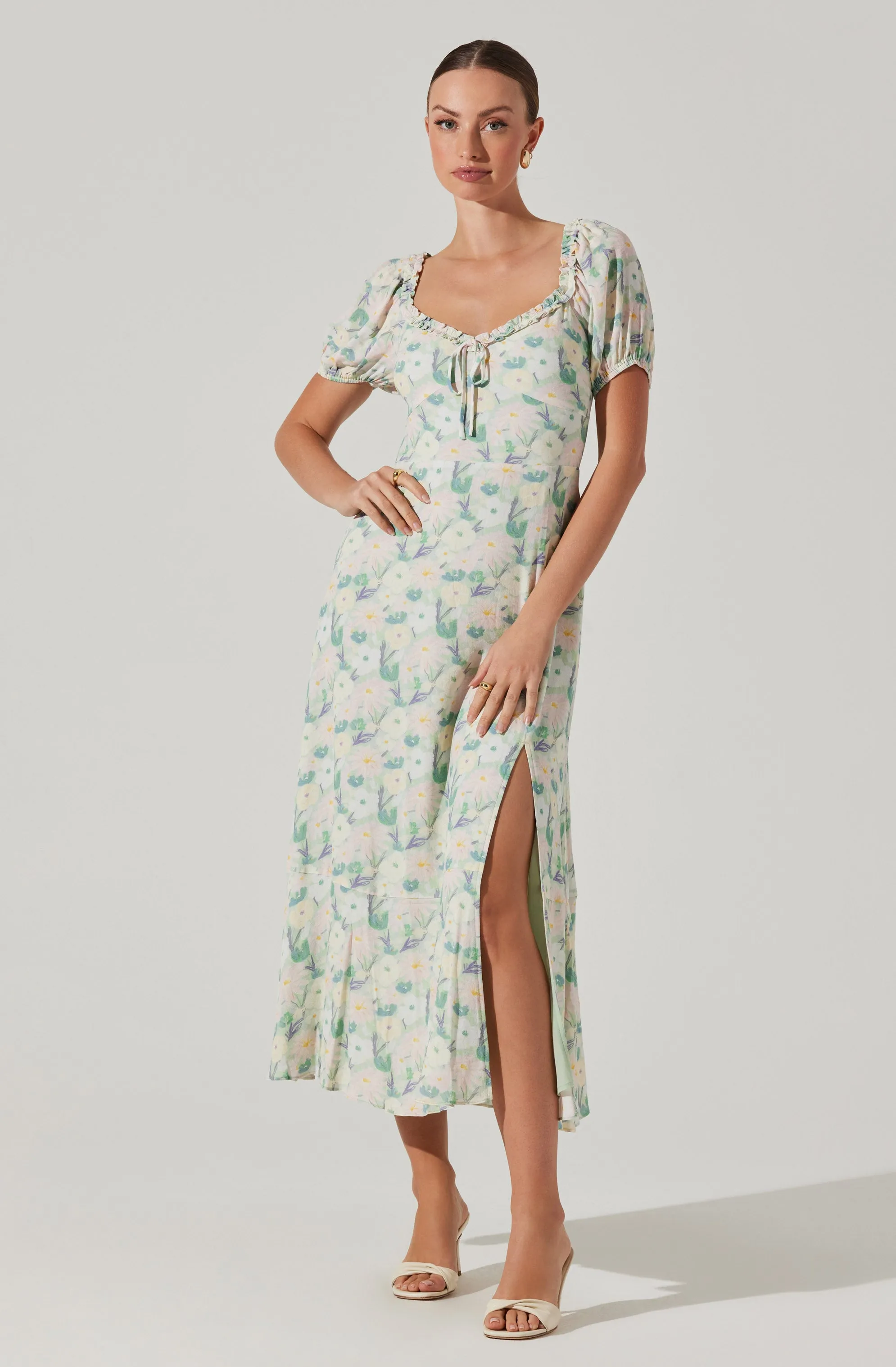 Puff Sleeve Floral Midi Dress sold by Astr
