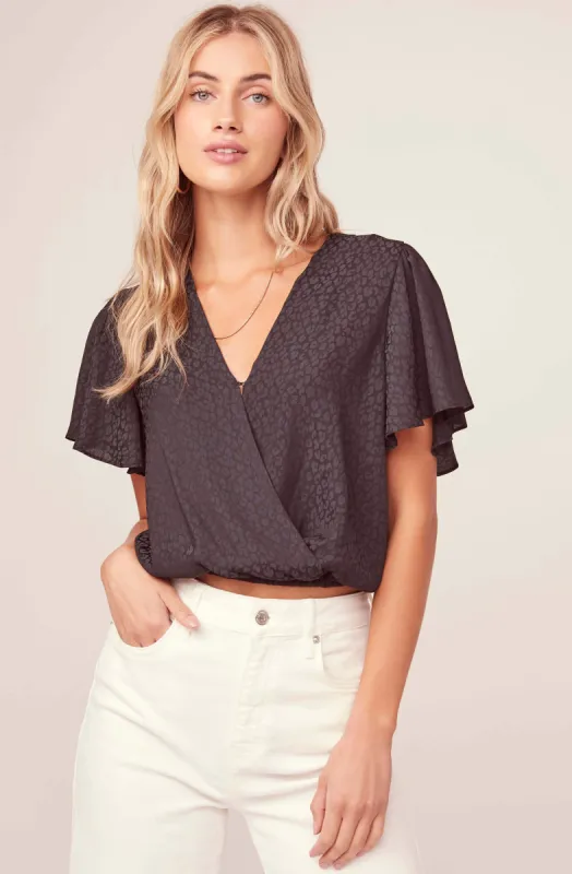 Jacquard Surplice Top sold by Astr