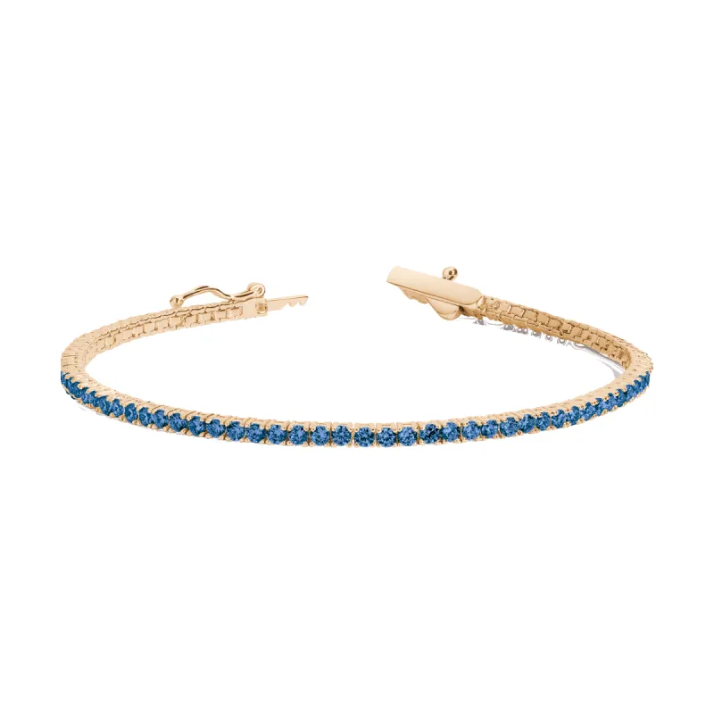 Lab Grown Blue Sapphire Tennis Bracelet sold by Aurate
