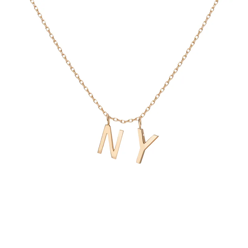 Double Mini Gold Letter Charm Pendant sold by Aurate
