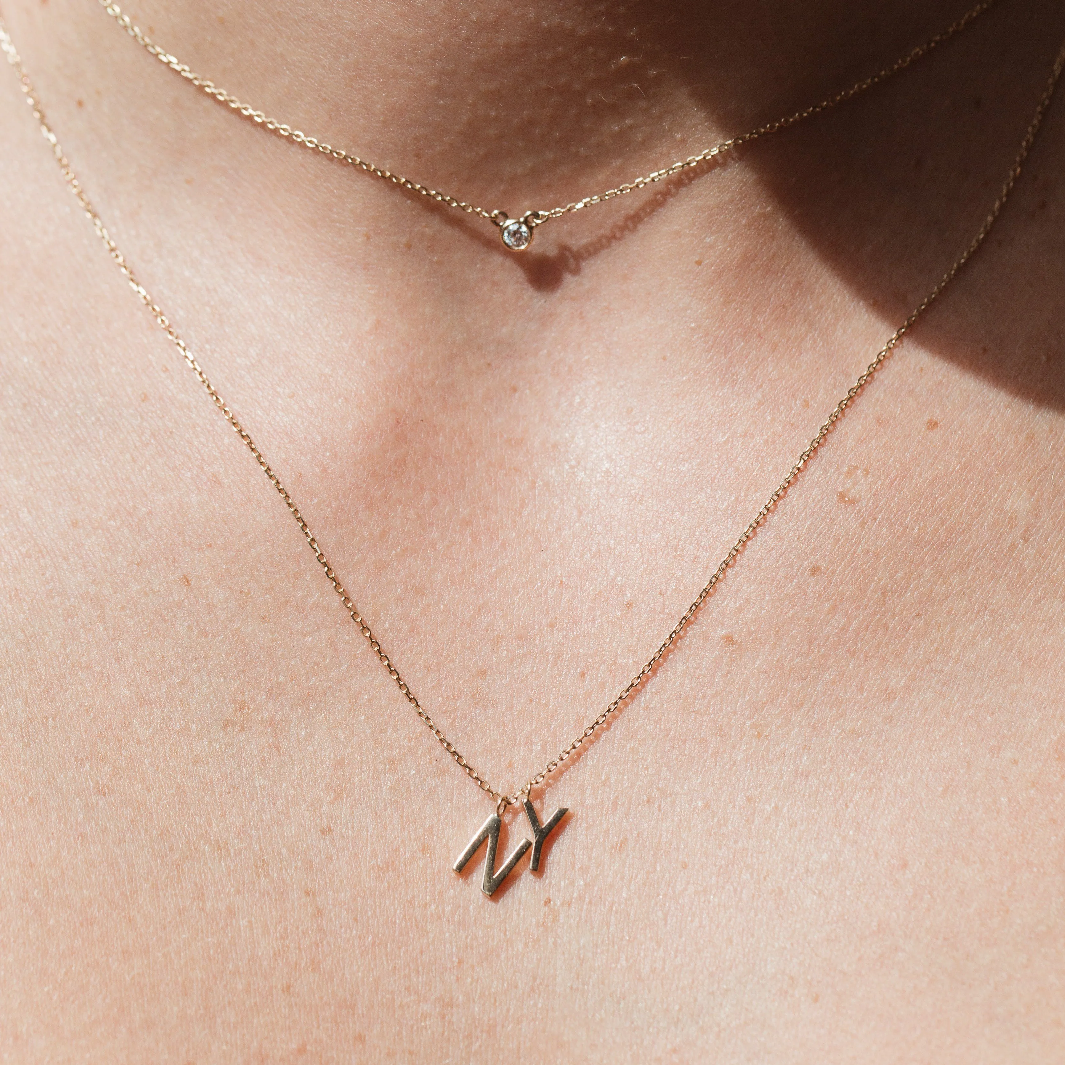 Double Mini Gold Letter Charm Pendant sold by Aurate product image thumbnail 5