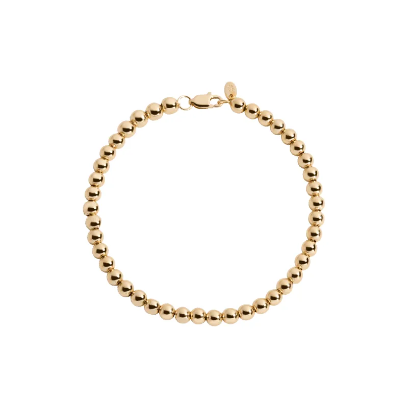 Gold Ball Bracelet sold by Aurate