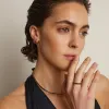 Lab Grown Blue Sapphire Baguette Huggie Earrings sold by Aurate