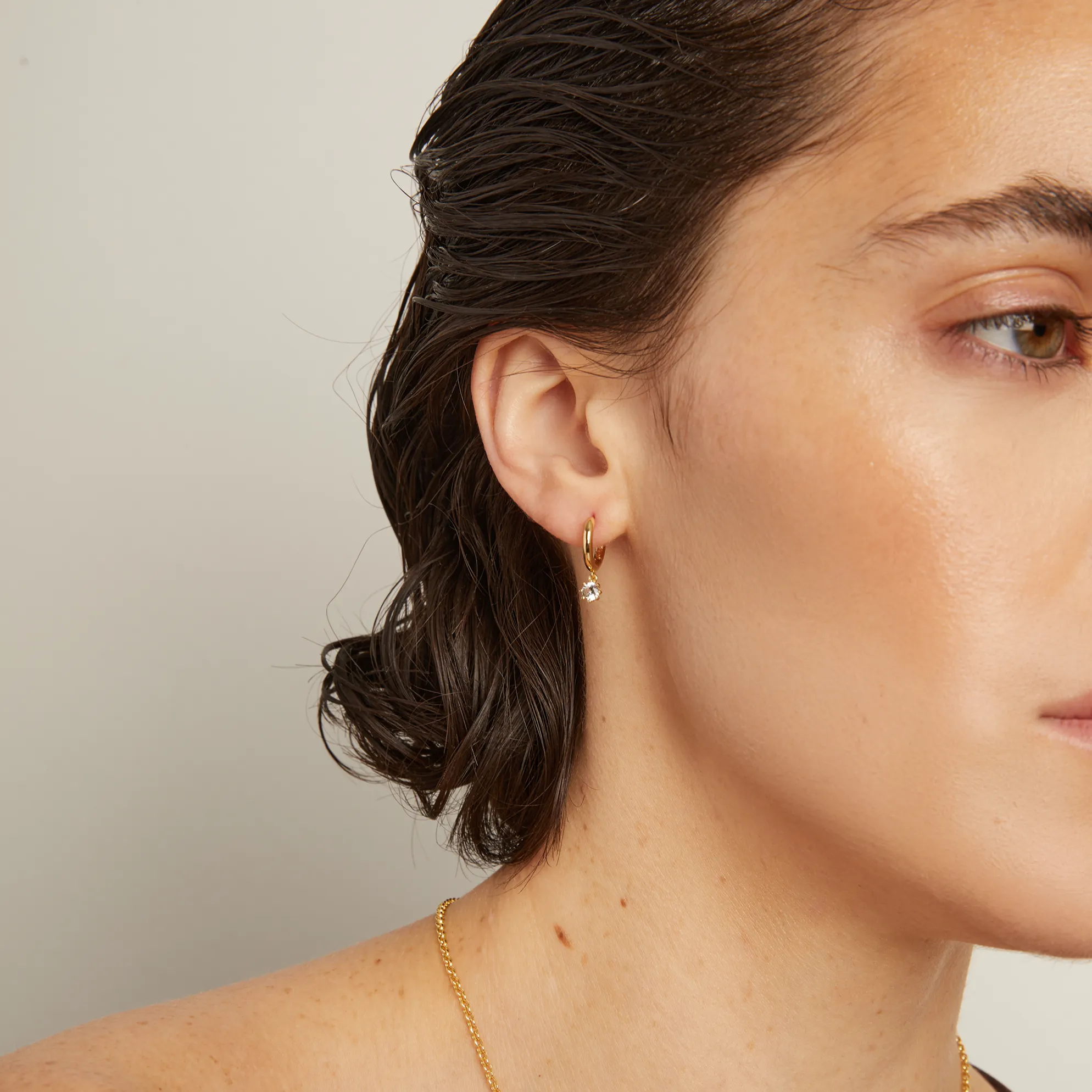 Lab Grown White Sapphire Drop Huggie Earrings sold by Aurate product image thumbnail 4