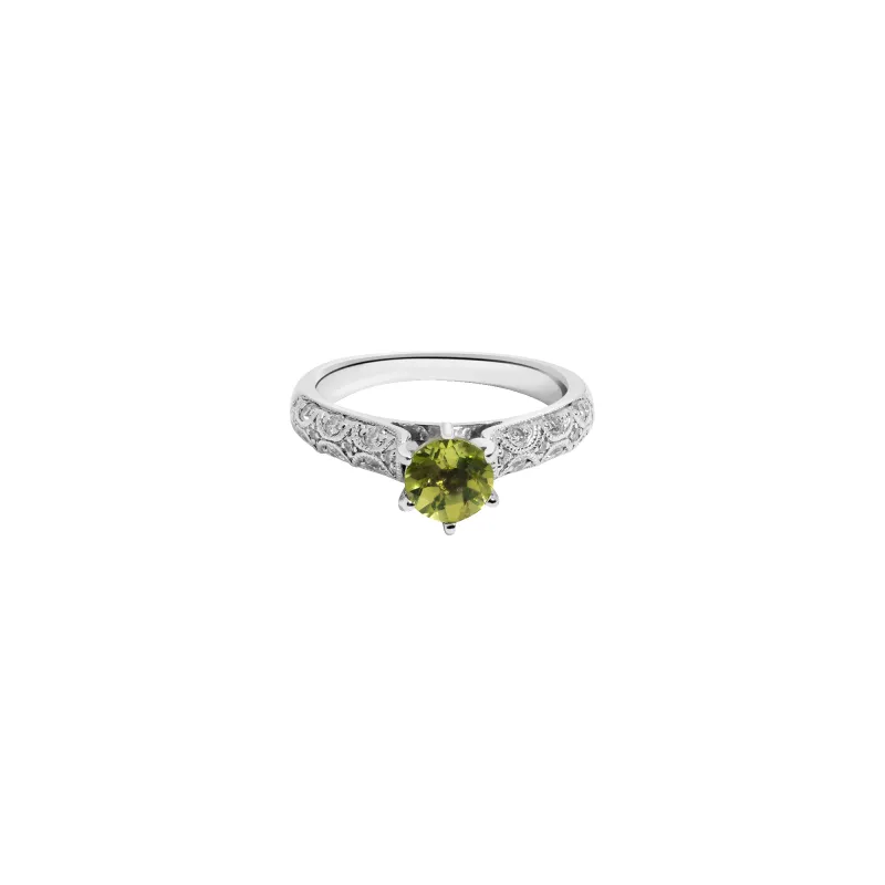 Vintage Six Prong Peridot and Diamond Ring sold by Aurate