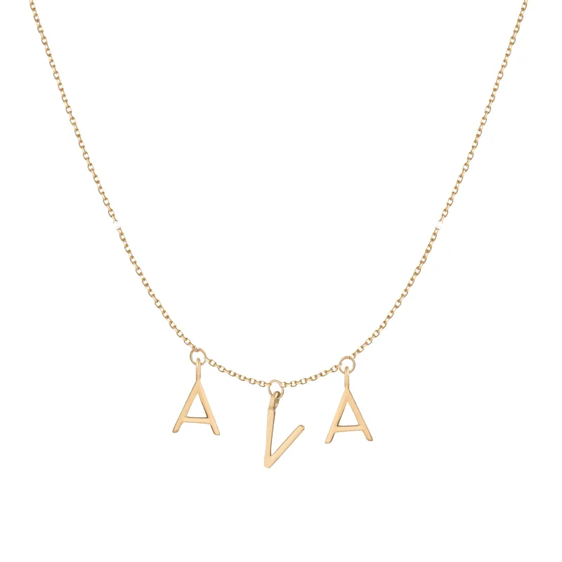 Gold Station Letter Necklace made by Aurate