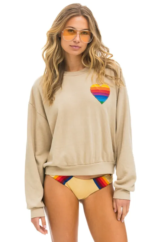 RAINBOW HEART STITCH RELAXED CREW SWEATSHIRT - SAND sold by Aviator Nation
