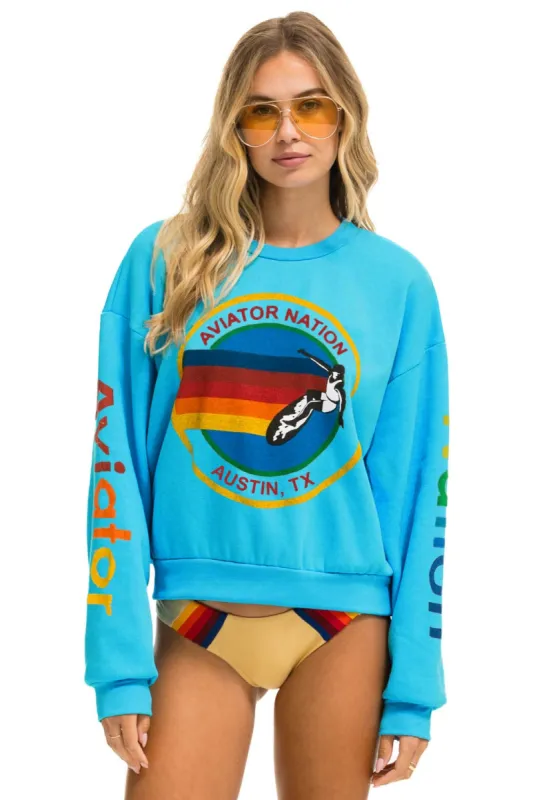 AVIATOR NATION AUSTIN RELAXED CREW SWEATSHIRT - NEON BLUE sold by Aviator Nation