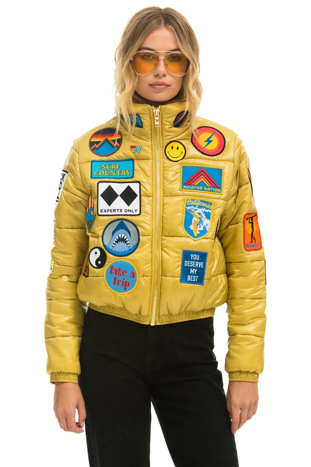 VINTAGE PATCH APRES PUFFER JACKET - HONEY GLOSSY sold by Aviator Nation