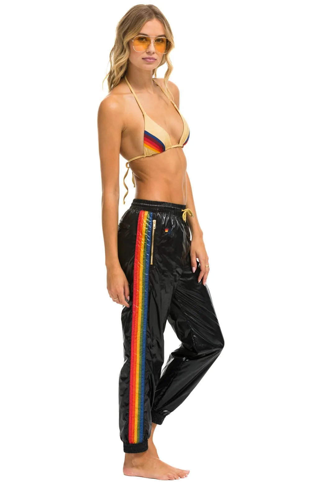 WOMEN'S 5 STRIPE WIND PANT - BLACK GLOSSY sold by Aviator Nation