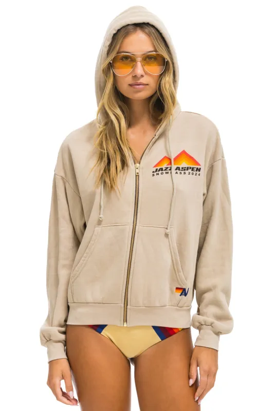 JAZZ ASPEN SNOWMASS 2024 ZIP HOODIE RELAXED - SAND made by Aviator Nation
