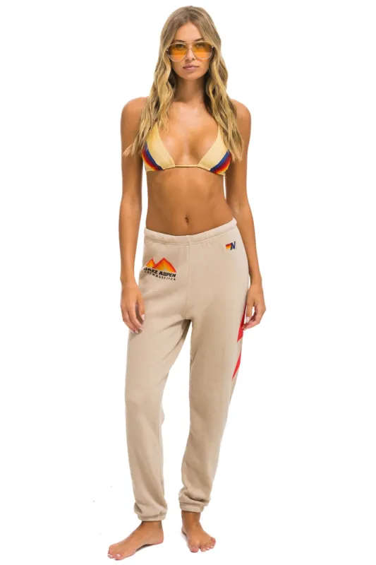 JAZZ ASPEN SNOWMASS 2024 UNISEX SWEATPANTS - SAND sold by Aviator Nation