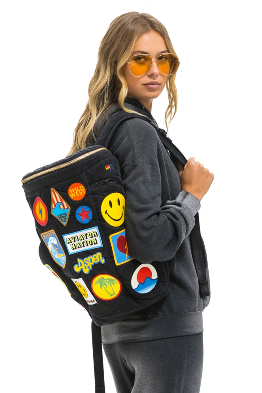 VINTAGE PATCH DENIM PUFFER BACKPACK - VINTAGE BLACK sold by Aviator Nation