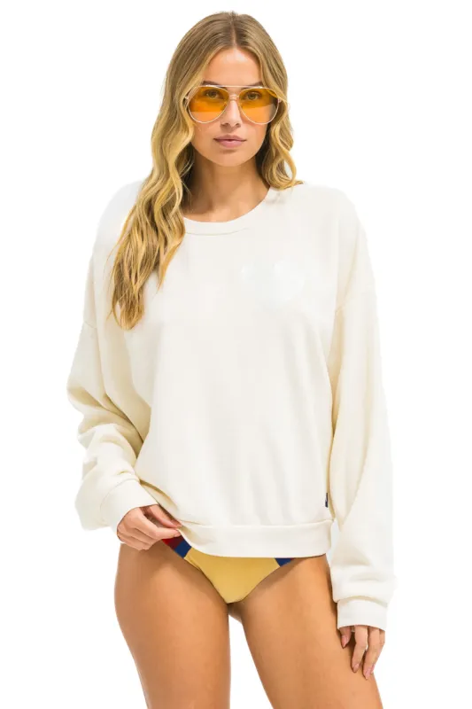 MEMBER EXCLUSIVE: GLITTER HEART RELAXED CREW SWEATSHIRT - VINTAGE WHITE // SILVER sold by Aviator Nation