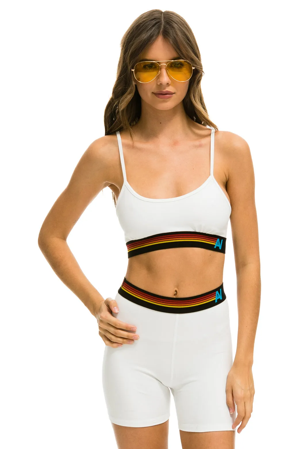 MEMBER EXCLUSIVE: LOGO 4 INCH HI-RISE BIKER SHORT - WHITE sold by Aviator Nation