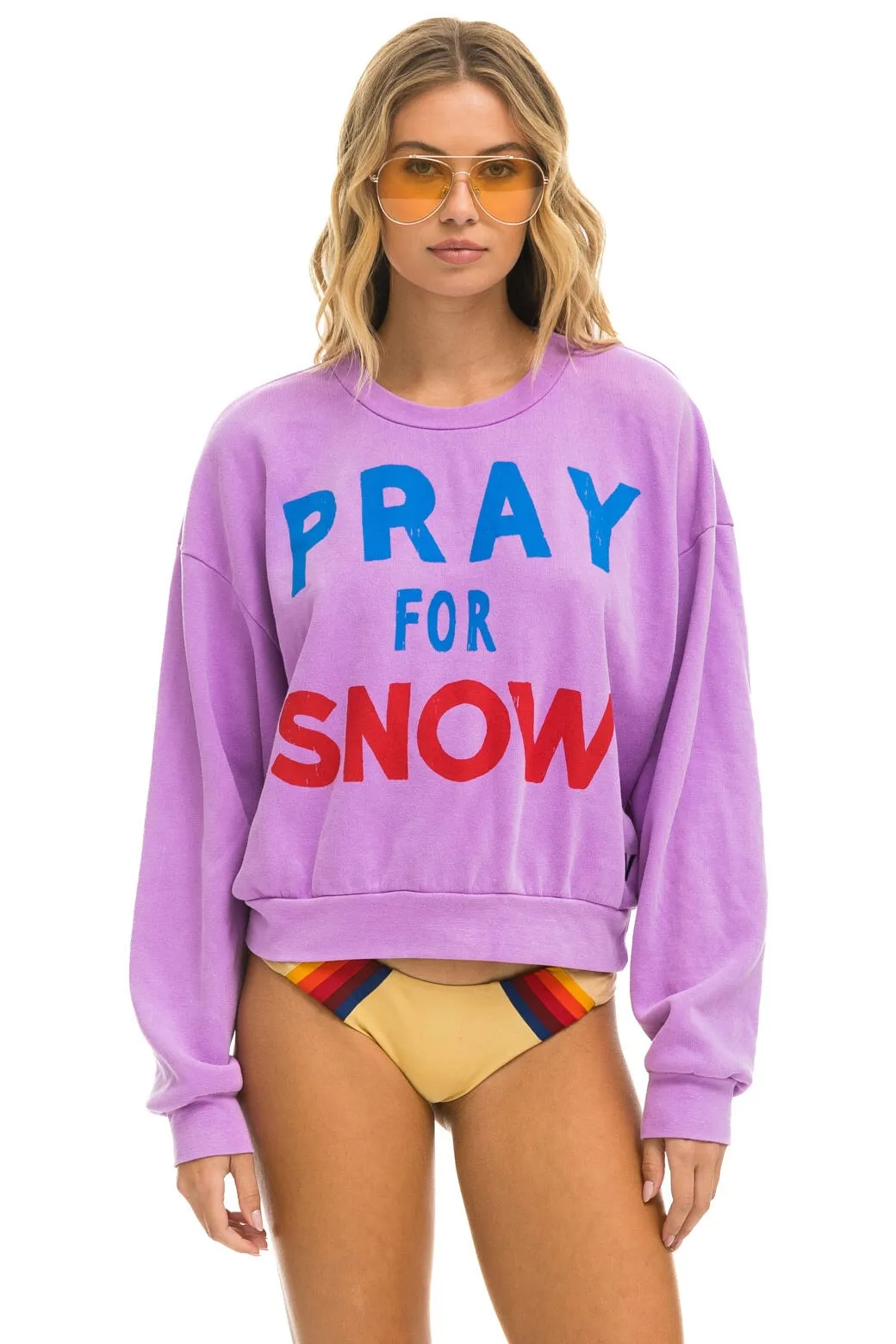 PRAY FOR SNOW RELAXED CREW SWEATSHIRT - NEON PURPLE sold by Aviator Nation