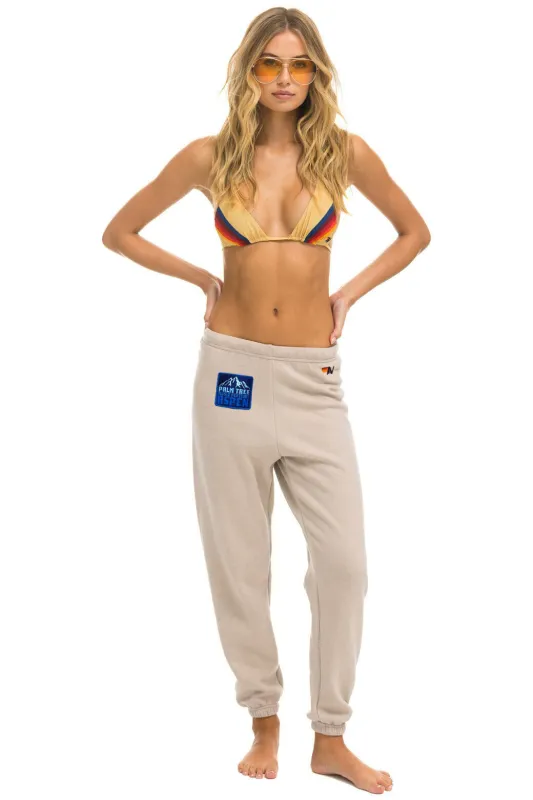 PALM TREE FESTIVAL ASPEN 2025 UNISEX SWEATPANTS - SAND sold by Aviator Nation